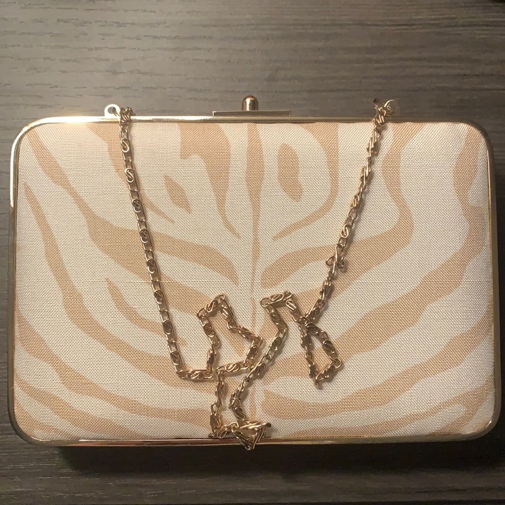 J McLaughlin cream zebra print clutch handbag